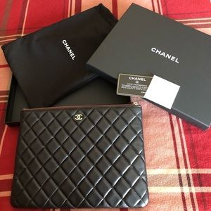 Chanel o case black lambskin